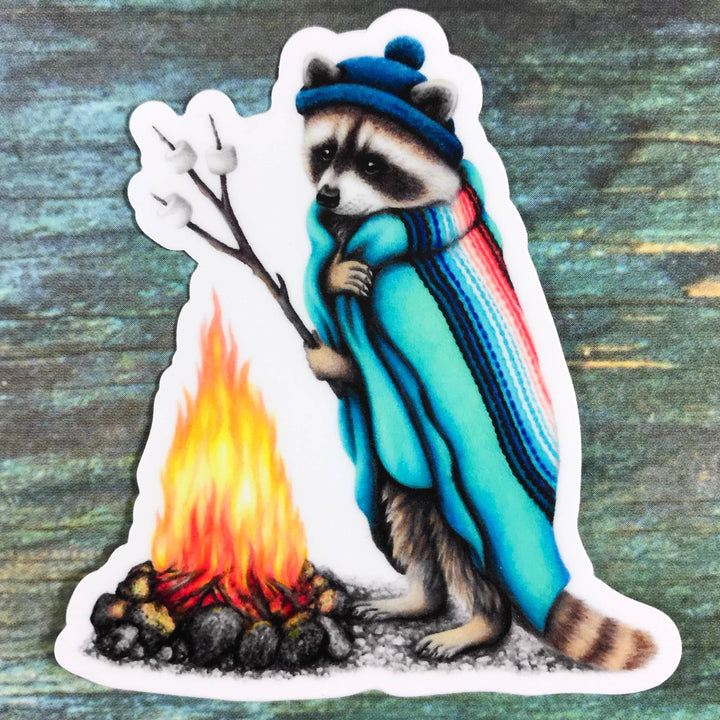Raccoon roasting marshmallows sticker - Stone & Spoon