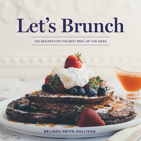 Indulge in weekend delights: a stack of fluffy pancakes topped with whipped cream, fresh berries, and breakfast meats, perfect for a Let's Brunch: 100 Recipes for the Best Meal of the Week gourmet Southern flavors brunch experience by Gibbs Smith.