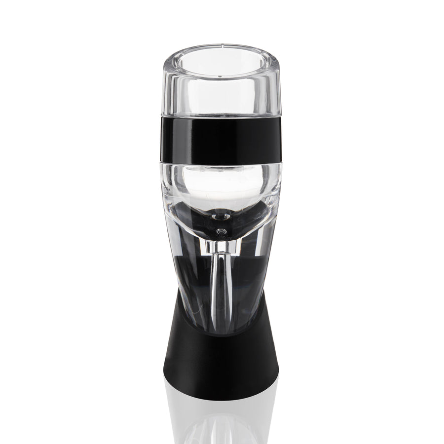 An elegant Aereo™ Wine Aerator by True with a clear body, black handle, and base, set against a white background, doubling as an aerator.